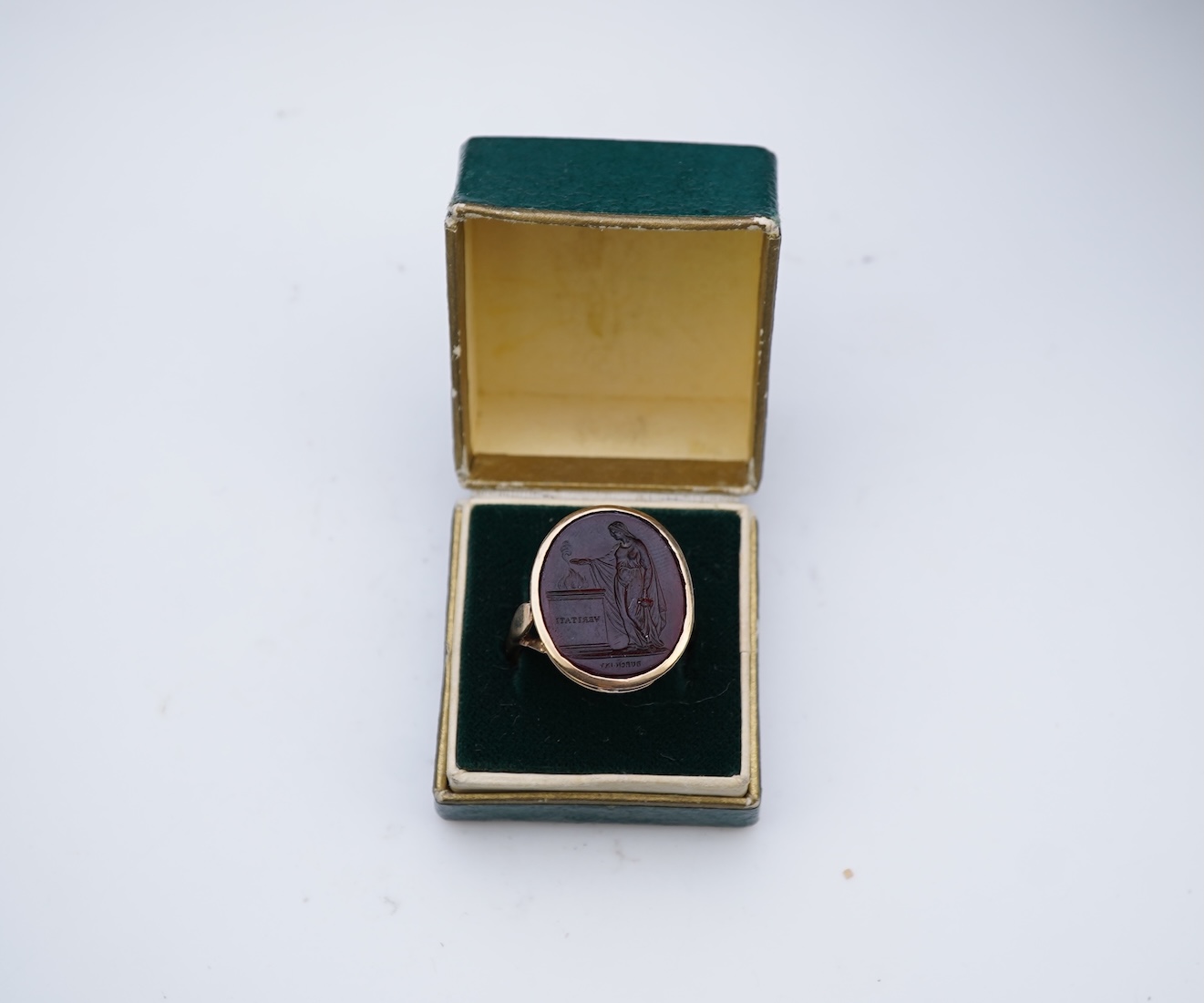 A glass intaglio ring, early 20th century
